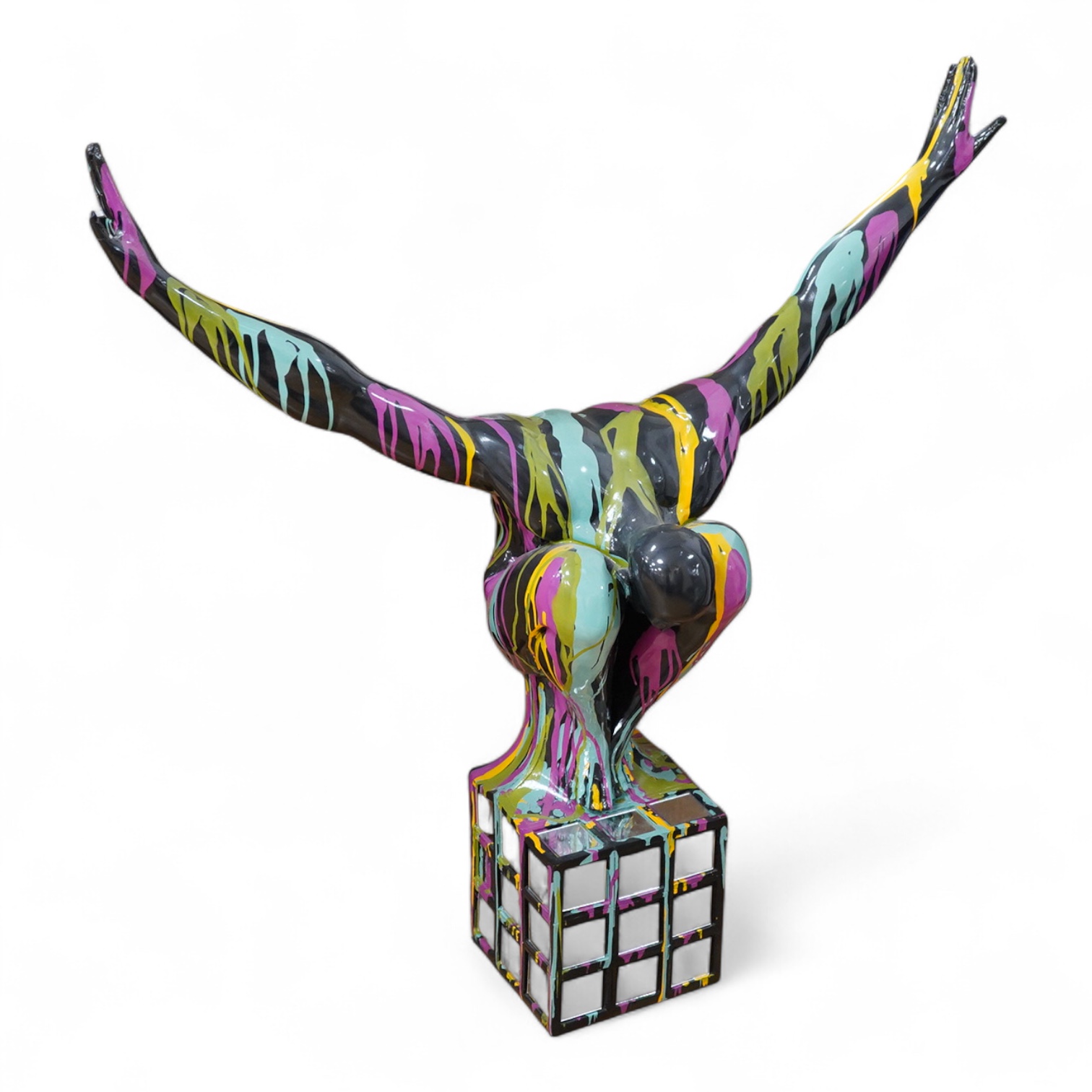 A large contemporary multicoloured composition sculpture of a diver, with mirrored base, 81cm high